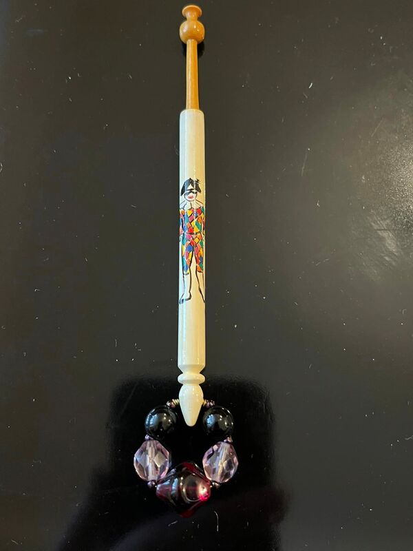 Turned and painted wooden bobbin by Bill and Brenda Wraight photo ©the lace bee