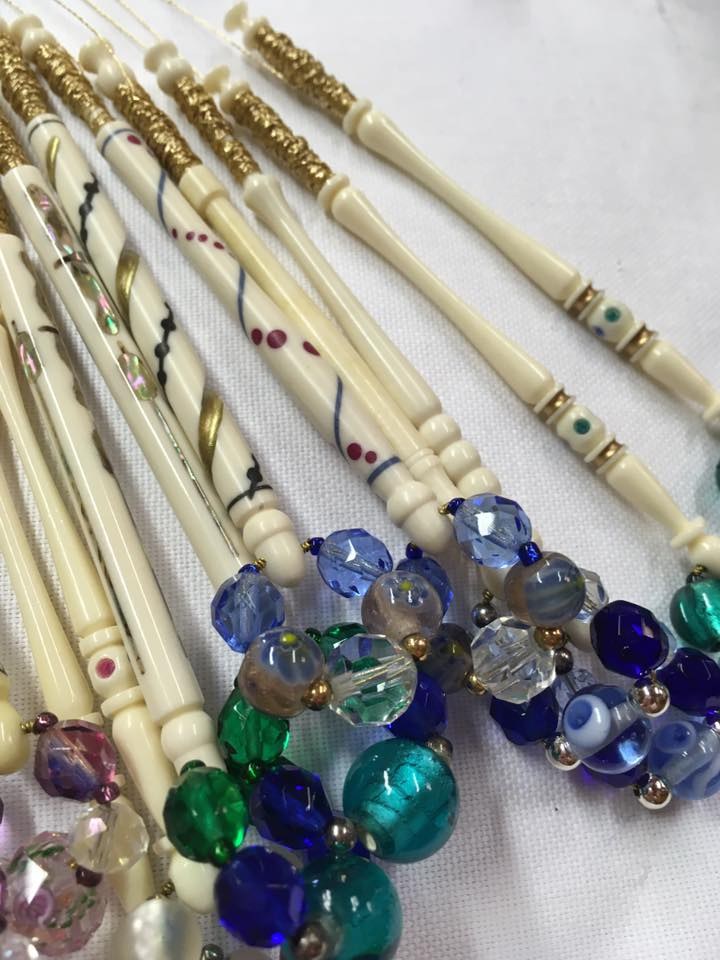Decorated bobbins and colourful spangles