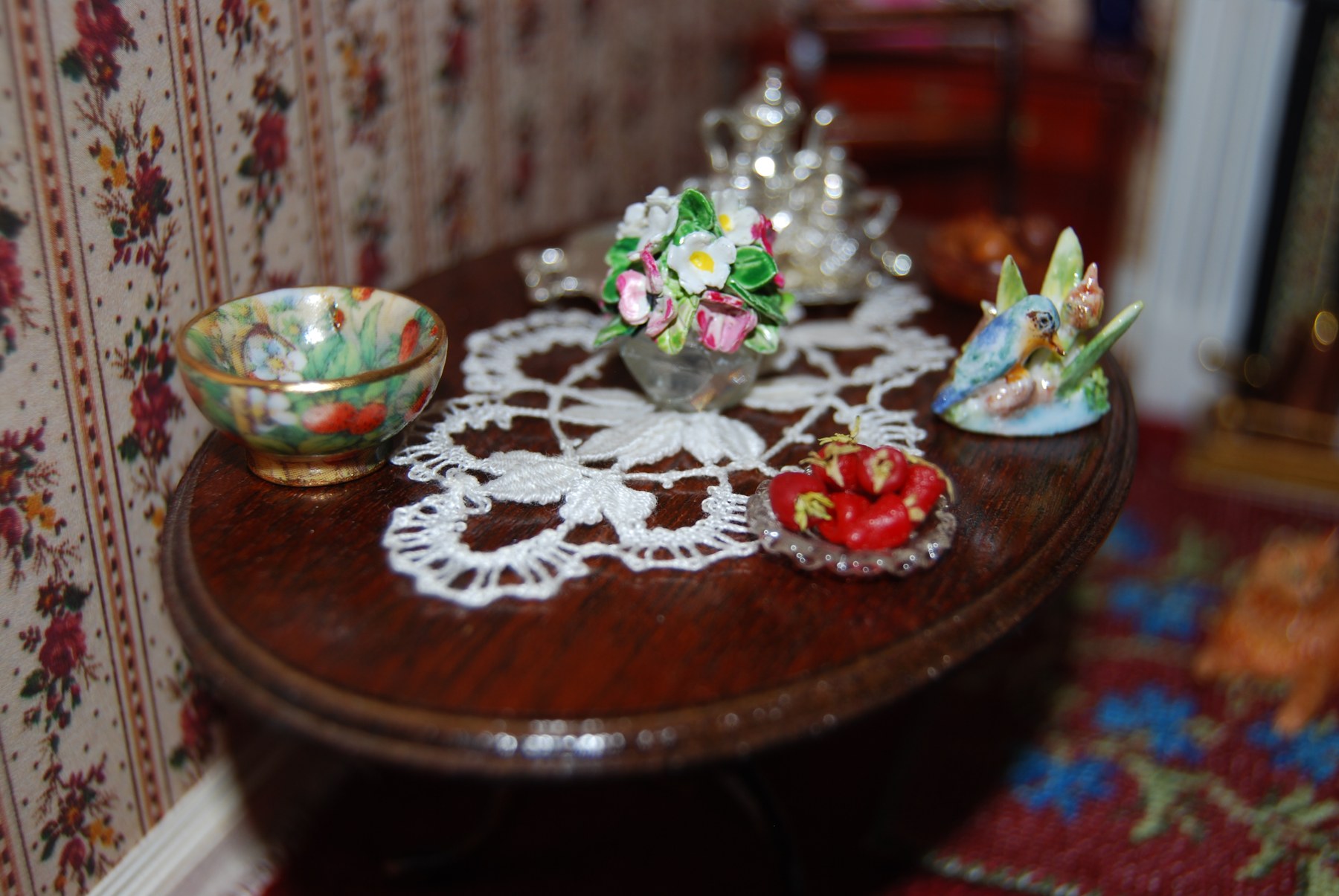 Miniature lace tablecloth in a dolls’ house